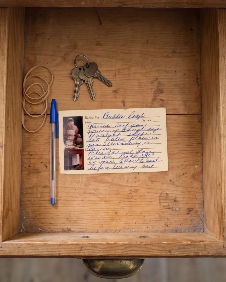 The same Bubble Loaf recipe card lying in an old kitchen drawer with keys, rubber bands and a pen.